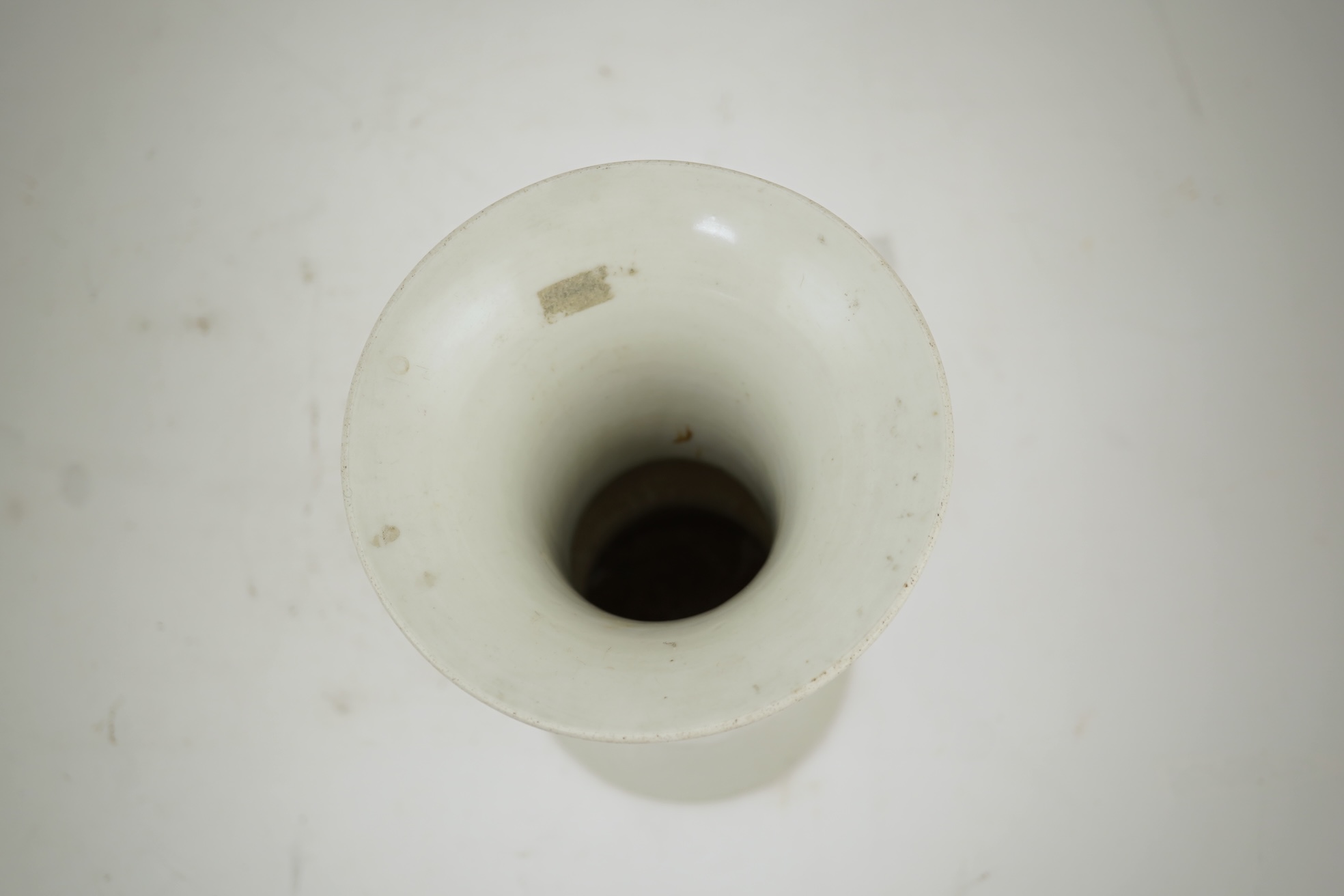 A Chinese white glazed 'gu' vase, 19th century